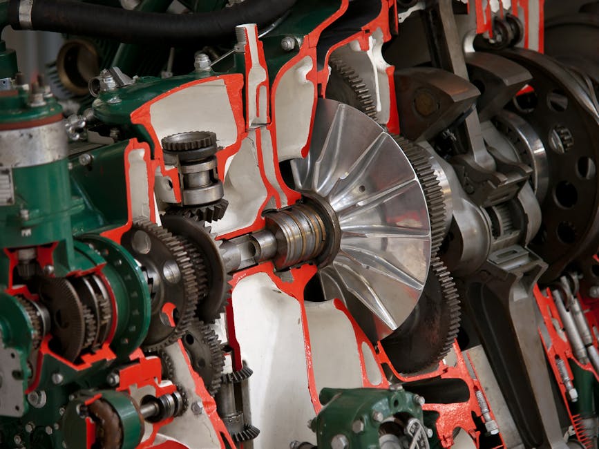 Detailed view of industrial machinery showcasing gears and cogs inside a mechanical system