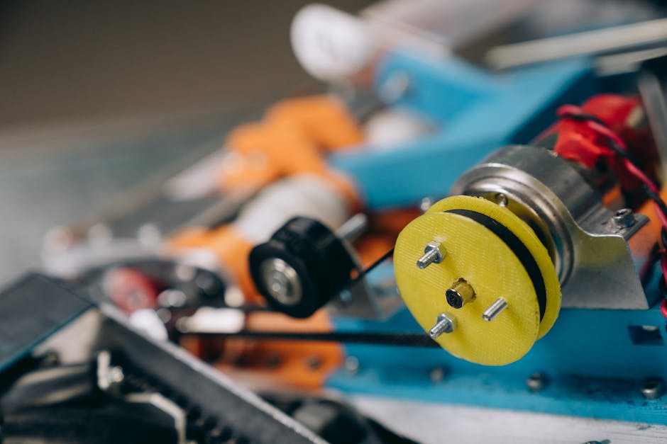 Detailed view of machine gears and components, focusing on engineering elements